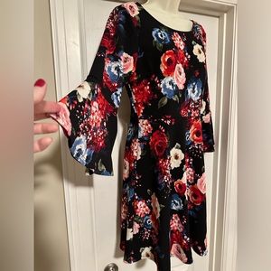 NWT Slip on relaxed fit, modest dress, 3/4 bell sleeves. Stretchy no-iron fabric